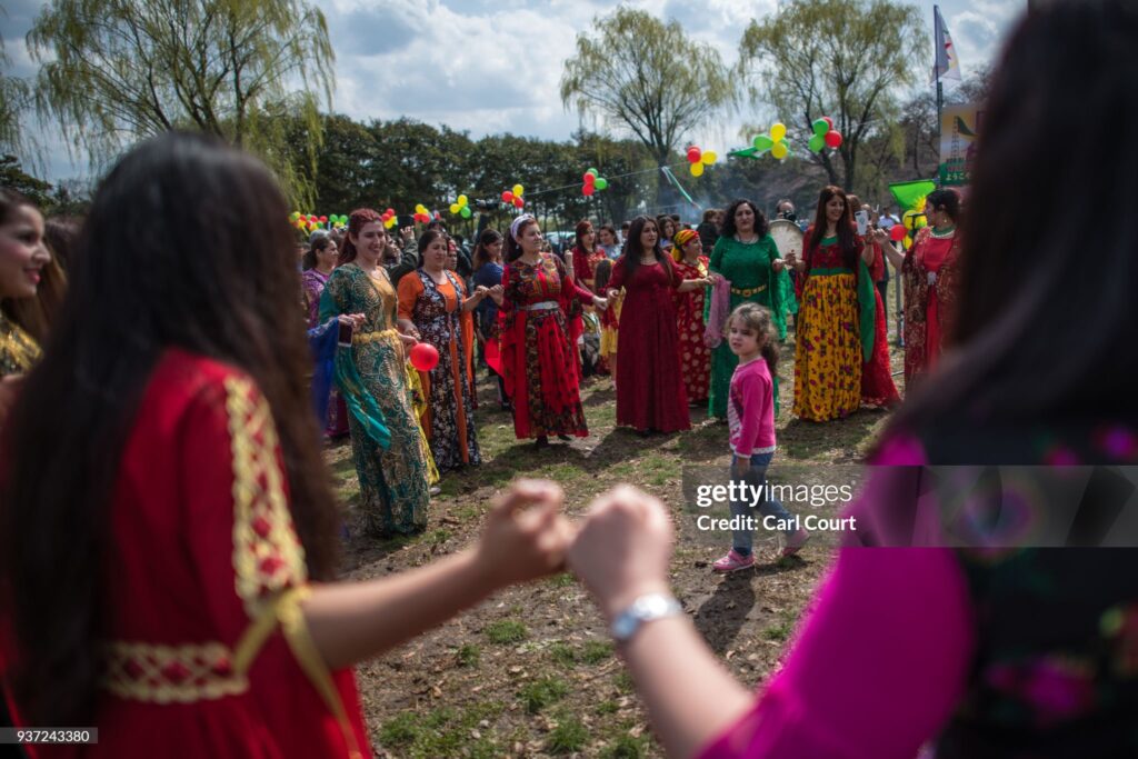 TOKYO, JAPAN - MARCH 24:  Kurdish women dance during Nowruz celebrations on March 24, 2018 in Tokyo, Japan. Nowruz meaning 'new day' and marking the first day of spring, is widely celebrated by Kurdish communities around the world including in Japan where an estimated 2000 Kurds reside, many of whom are claiming refugeeÊstatus owing to alleged human rights abuses in Turkey and Iraq. Although the Japanese government has issued some temporary permits allowing many to stay for years, no Turkish Kurd has ever been received refugee status in Japan, which would allow them to settle permanently.Ê  (Photo by Carl Court/Getty Images)