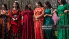 TOKYO, JAPAN - MARCH 24:  Kurdish women chat as they wait to dance during Nowruz celebrations on March 24, 2018 in Tokyo, Japan. Nowruz meaning 'new day' and marking the first day of spring, is widely celebrated by Kurdish communities around the world including in Japan where an estimated 2000 Kurds reside, many of whom are claiming refugeeÊstatus owing to alleged human rights abuses in Turkey and Iraq. Although the Japanese government has issued some temporary permits allowing many to stay for years, no Turkish Kurd has ever been received refugee status in Japan, which would allow them to settle permanently.Ê  (Photo by Carl Court/Getty Images)