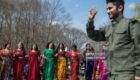 TOKYO, JAPAN - MARCH 24: A Kurdish man films with his phone as Kurdish women dance during Nowruz celebrations on March 24, 2018 in Tokyo, Japan. Nowruz meaning 'new day' and marking the first day of spring, is widely celebrated by Kurdish communities around the world including in Japan where an estimated 2000 Kurds reside, many of whom are claiming refugee status owing to alleged human rights abuses in Turkey and Iraq. Although the Japanese government has issued some temporary permits allowing many to stay for years, no Turkish Kurd has ever been received refugee status in Japan, which would allow them to settle permanently.   (Photo by Carl Court/Getty Images)